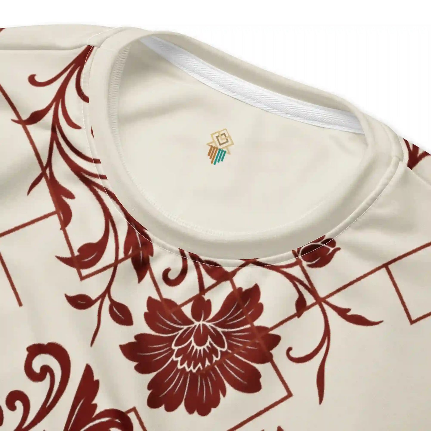 Close-up views of the white sweatshirt fabric, neckline ribbing, and seams. Highlights the quality of the print on the fabric and garment construction, showing the red floral pattern detail.