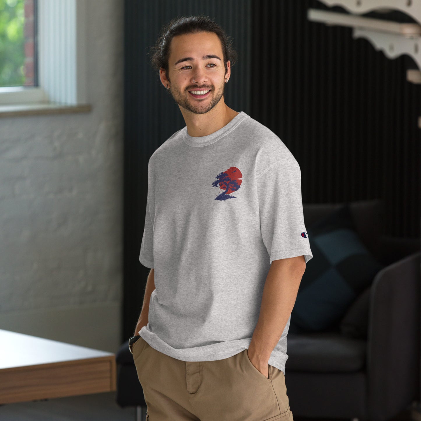 Discover the Champion Men's Embroidered Bonsai Sunset Tee. Crafted for premium comfort with an embroidered bonsai design, perfect for urban and adventure wear.