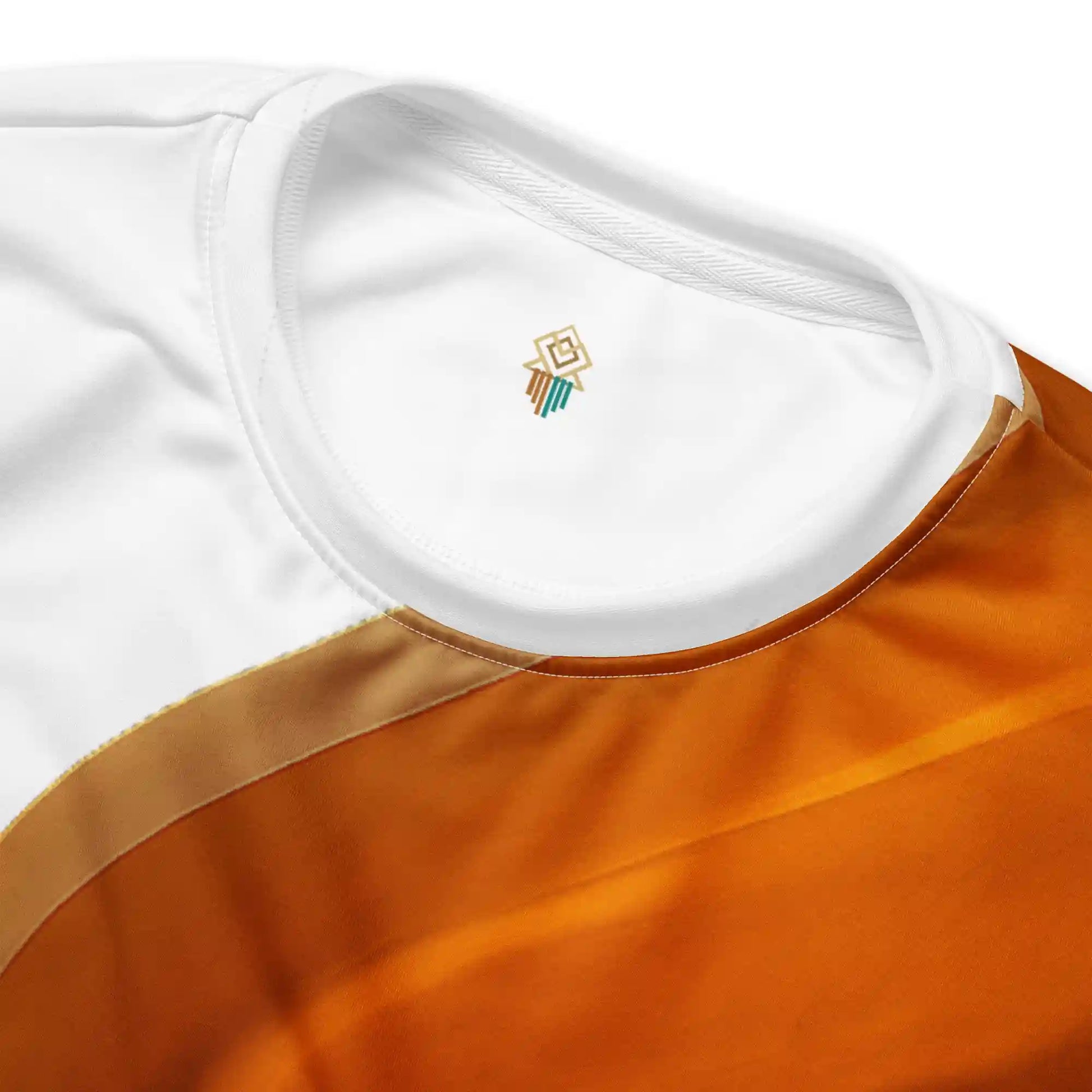 Close-up detail of swirl sweatshirt neckline, showing soft fabric texture and vivid orange-brown gradient wave design.