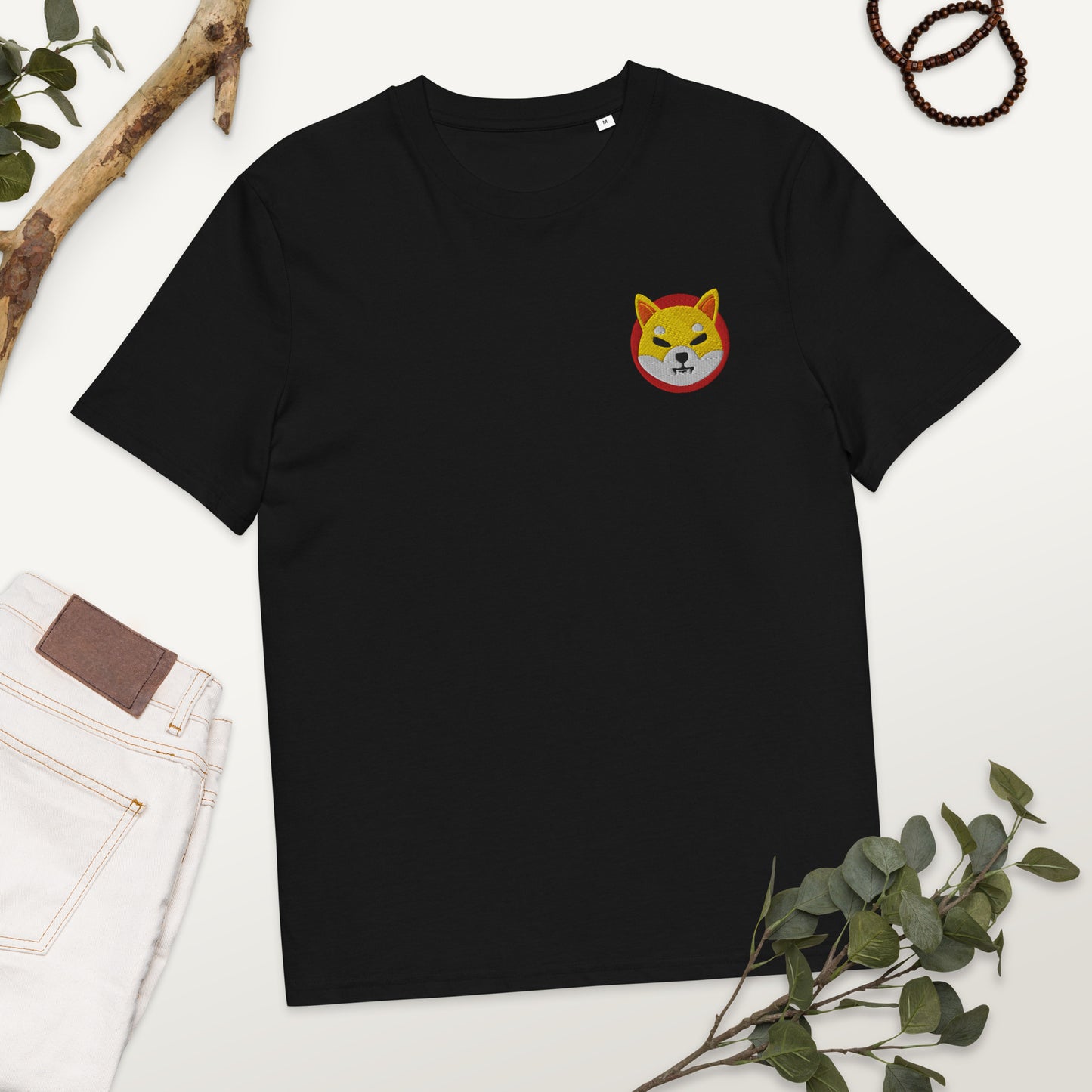 Chibi fox unisex organic cotton t-shirt with embroidered fox emblem. Soft, sustainable, and stylish for casual wear. Ethical and eco-friendly fashion.