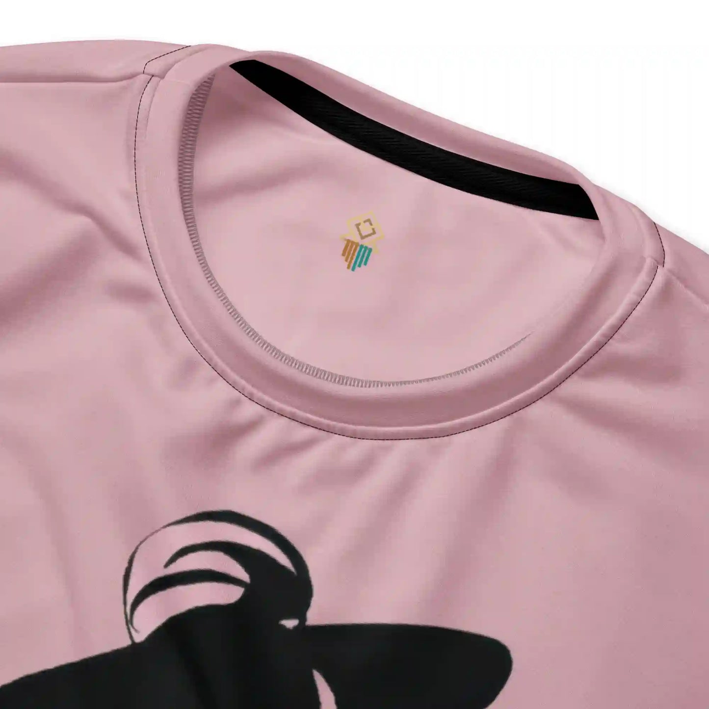 Close-up detail shot of the 'City Glamour Muse' sweatshirt, highlighting the bold lines of the fashion illustration, the soft pink fabric, and the ribbed crew neck collar.