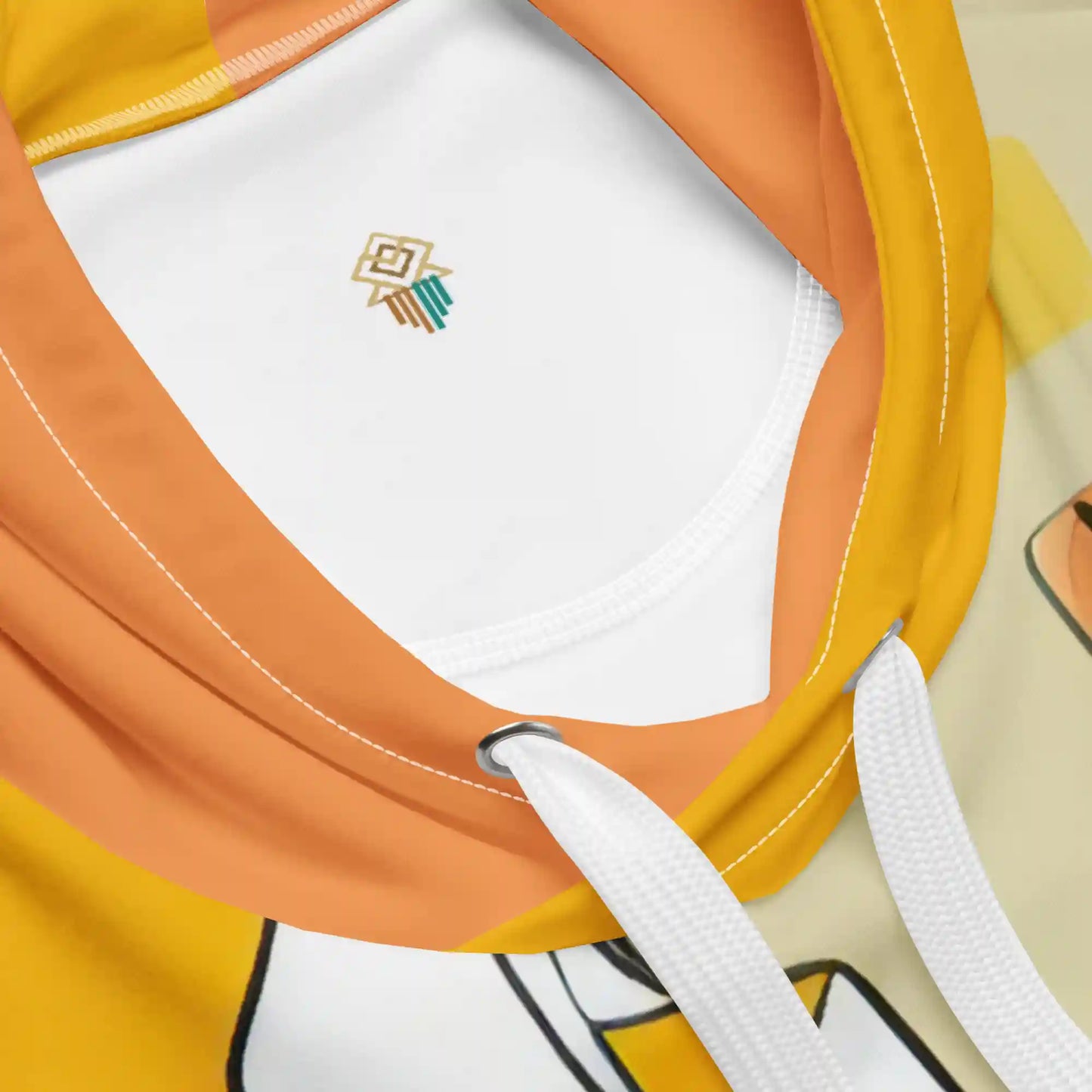 Close-up views of the yellow hoodie highlighting details including: drawstring and eyelet, stitching detail, brushed fabric texture, inside hood lining showing small logo, and tear-away care label area. Shows material texture and construction quality.