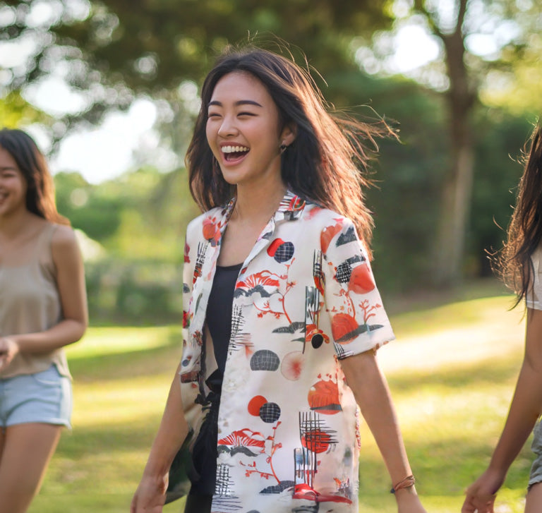 Featuring bold red and black Japanese-inspired patterns, this shirt is perfect for fashion-forward adventurers. Combining comfort with a striking design this lightweight, breathable shirt is a standout look. Explore the fusion of urban streetwear and cultural aesthetics today!