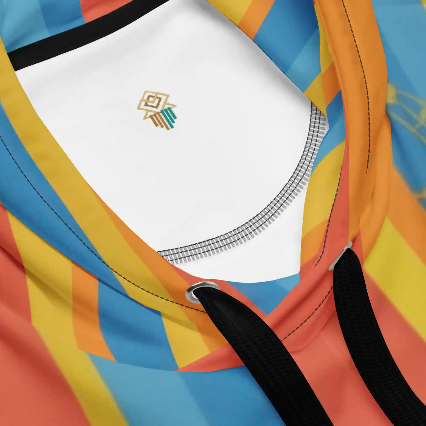 Close-up detail shot of the inside hood and collar of the retro music themed hoodie, showing the colorful striped fabric, black drawstrings, and a small brand tag.
