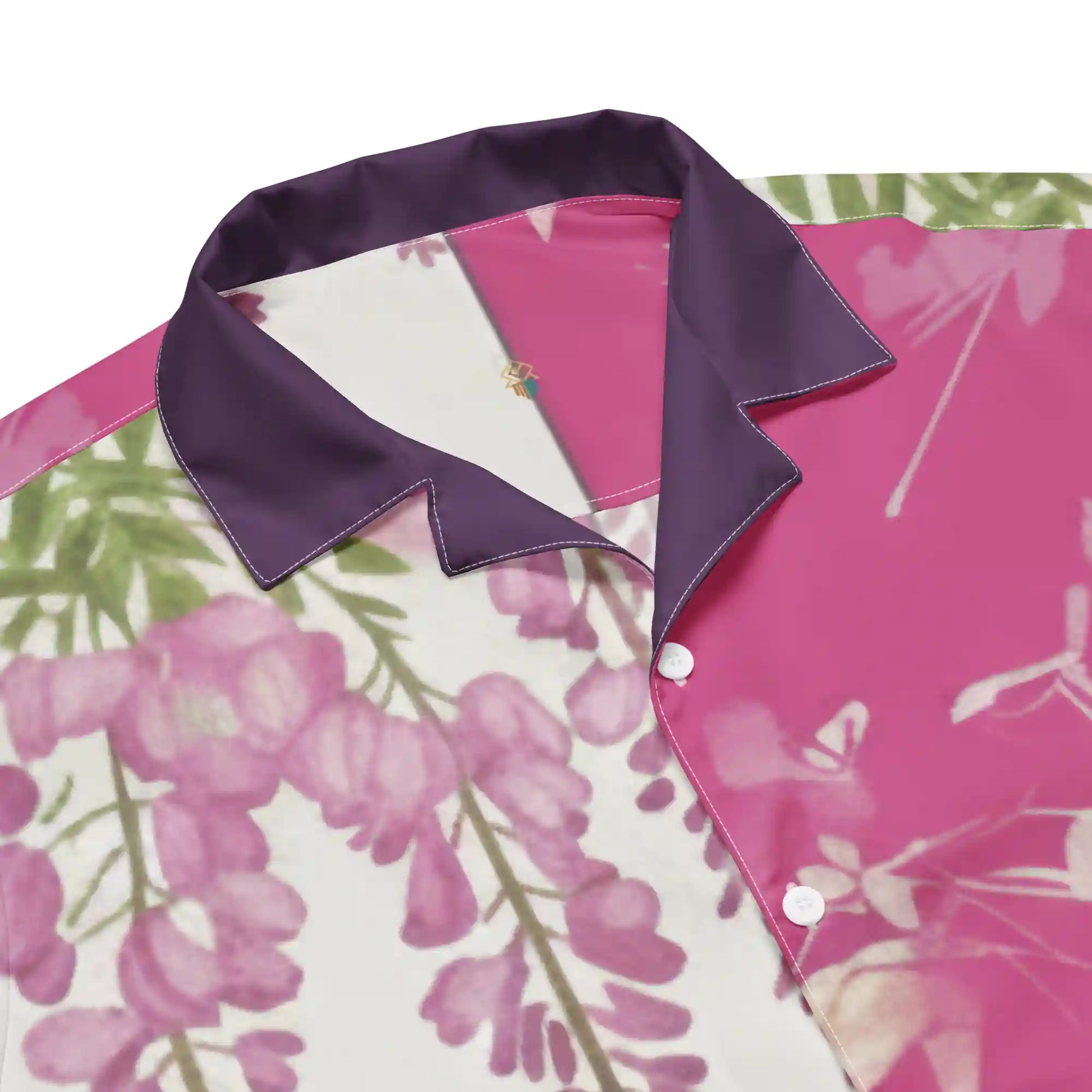 Close-up of Sakura Reverie floral button shirt collar, featuring deep plum trim and soft pink cherry blossom print.