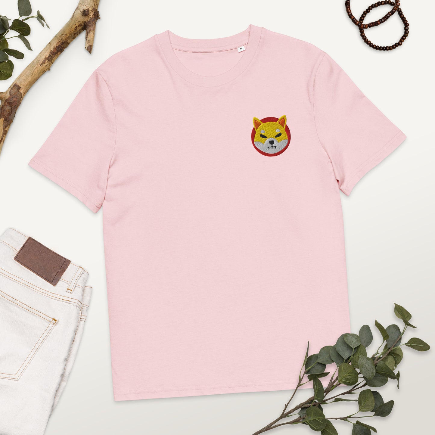 Chibi fox unisex organic cotton t-shirt with embroidered fox emblem. Soft, sustainable, and stylish for casual wear. Ethical and eco-friendly fashion.